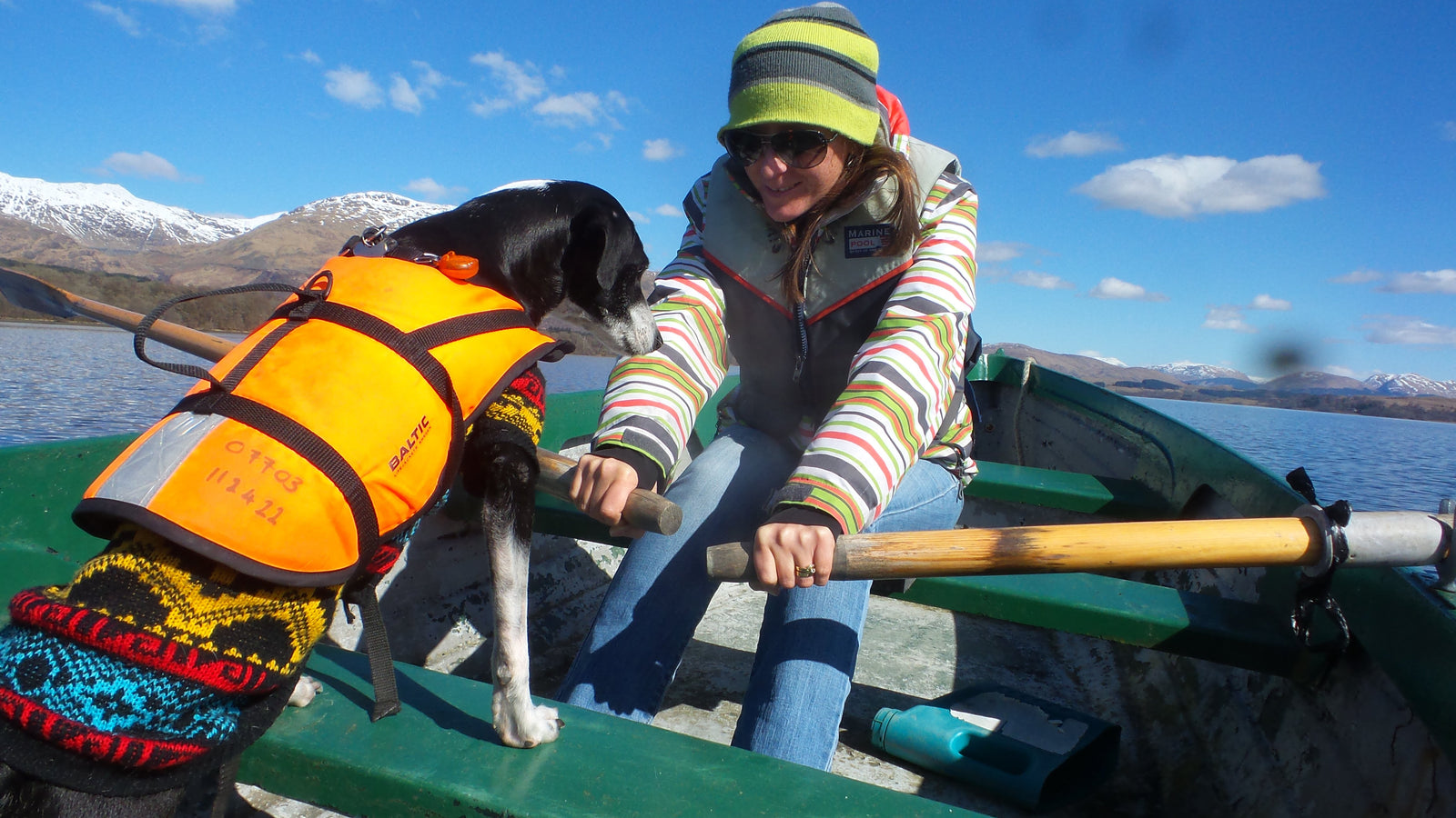 The Pack Track hired a boat on Loch Awe in Scotland. Weeti and Shadow worse floatation vests for safety, they don't like being wet!